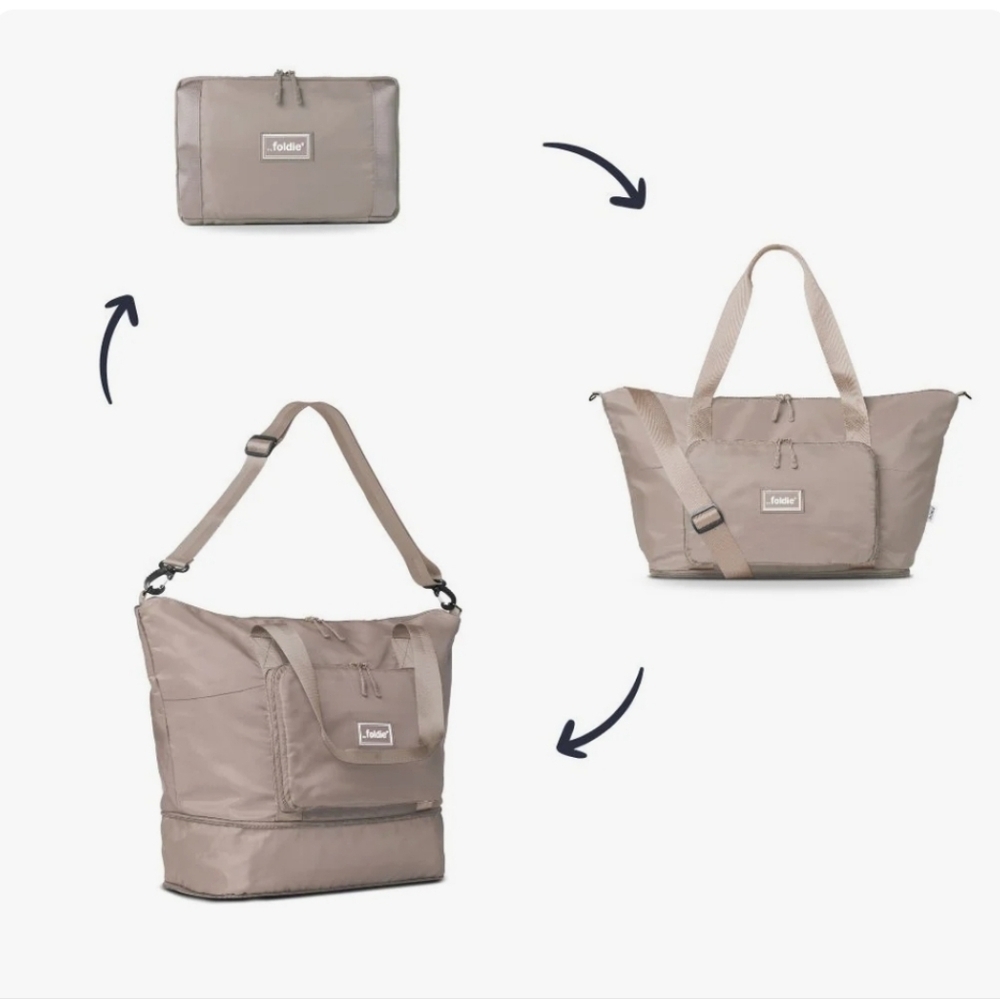 NWT THE FOLDIE THE ORIGINAL BEIGE TRAVEL BAG EXPANDABLE TOTE PACKABLE CARRY ON